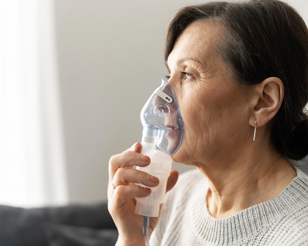woman with oxygen mask