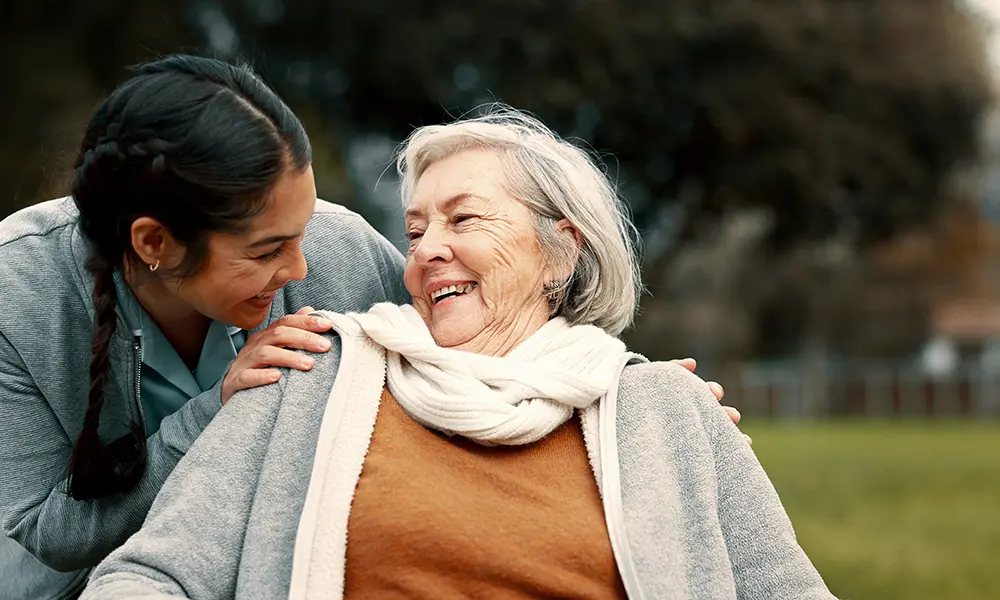 smiling woman in wheelchair